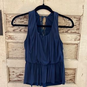 Soft Blue Sleeveless Blouse with cute tied back. Size M. Fits small